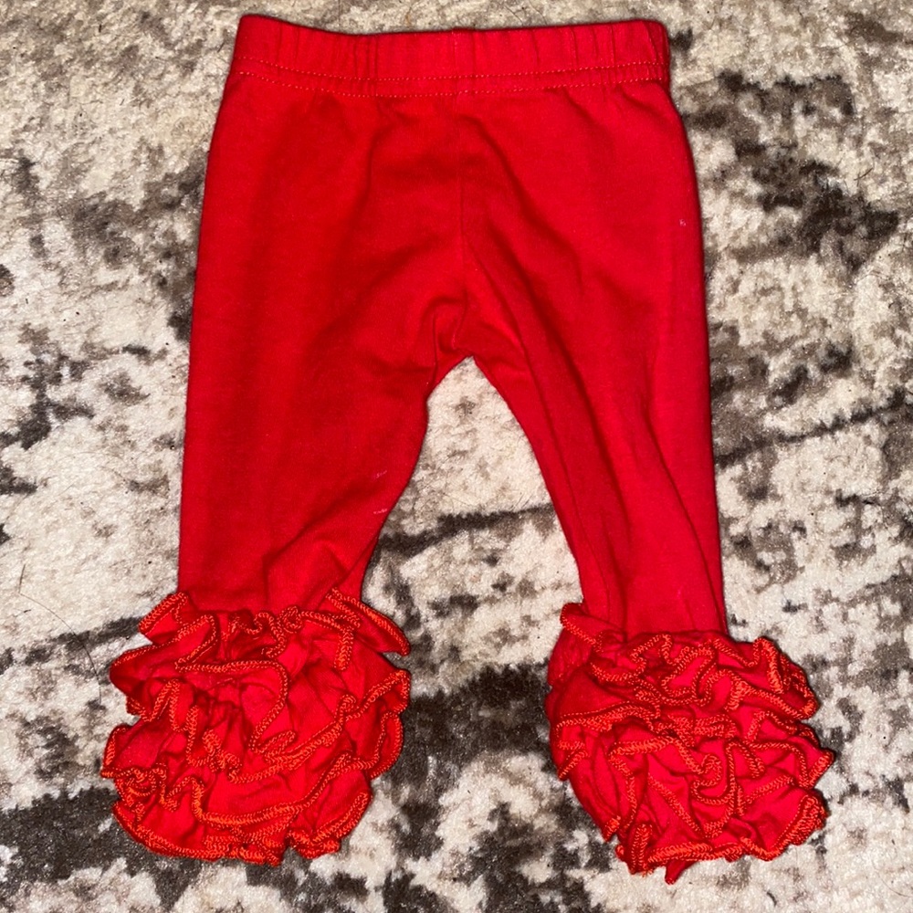 Red ruffle bottom pants